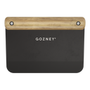 Top view of a Gozney dough cutter with a black blade and wooden handle.