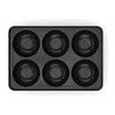 Top view of a black Gozney dough tray with six round compartments and its lid removed.