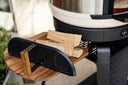 Gozney Dome Gen 2 Door, black ribbed panel with wooden handle resting on the stand side shelf beside a Bone Dome Gen 2