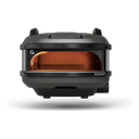 Off Black Gozney Tread portable pizza oven viewed from the front with a gas flame inside.